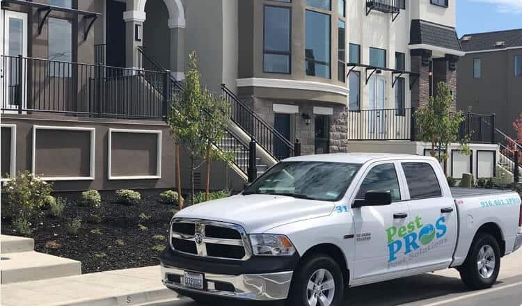 pest pros truck in front of residence